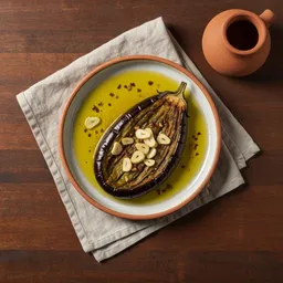 باذنجان مشوي بالثوم وزيت الزيتون